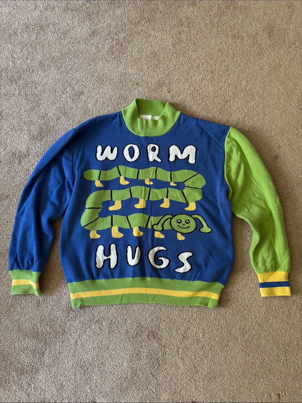 Kina and Tam Worm Hugs sweater